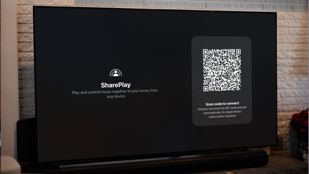 A TV with the SharePlay screen up, showing a QR code to add music to the playlist