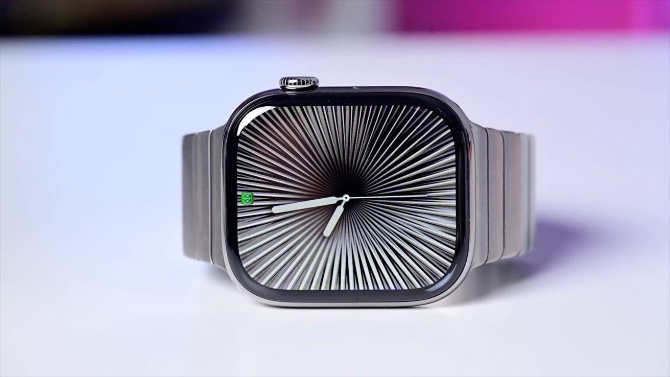Smartwatch with stainless steel band, displaying an optical illusion dial featuring black and white radial lines converging at the center.